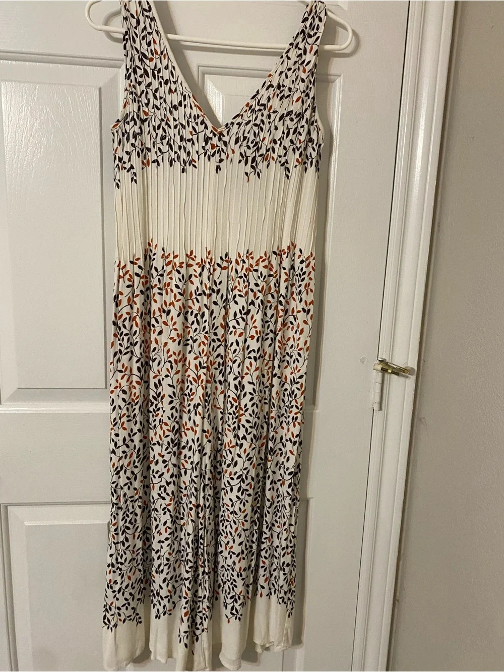 Sleeveless Cream Maxi Dress with Black and Rust Leaf Print